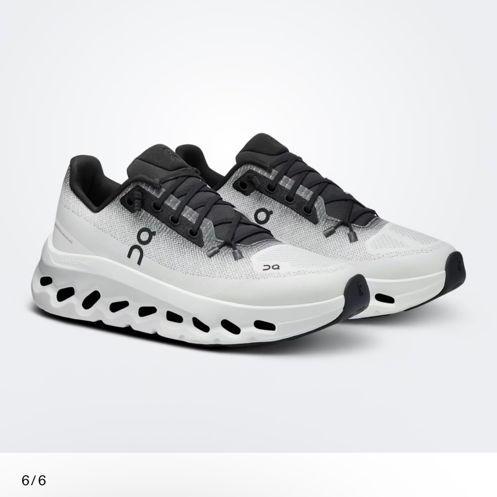 On “Cloudtilt” black/ivory, size 8